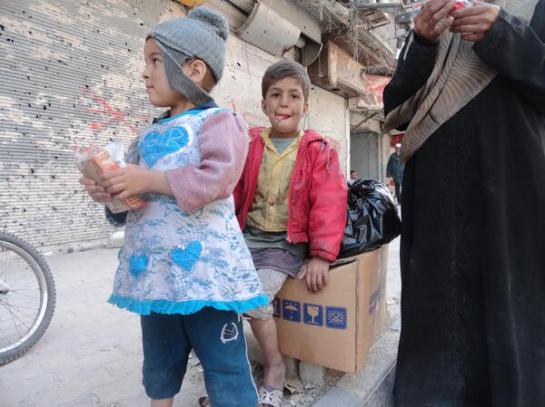 Children in the besieged Yarmouk refugee camp. 